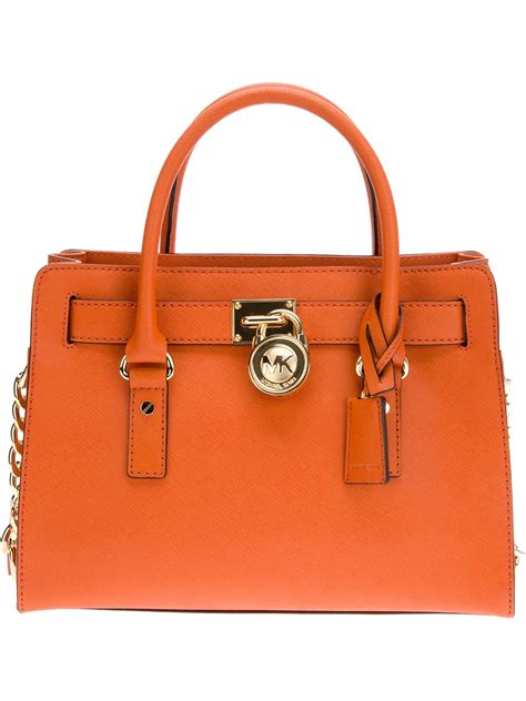 sac michael kors orange|michael kors black satchel bag.